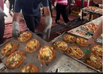 Pizza At A Langar?! Viral Video Shows Volunteers Serving It But Internet Is Not Happy Pizza At A Langar?! Viral Video Shows Volunteers Serving It But Internet Is Not Happy