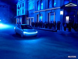 Elon Musk's Tesla Promises Paid Robotaxis Next Year