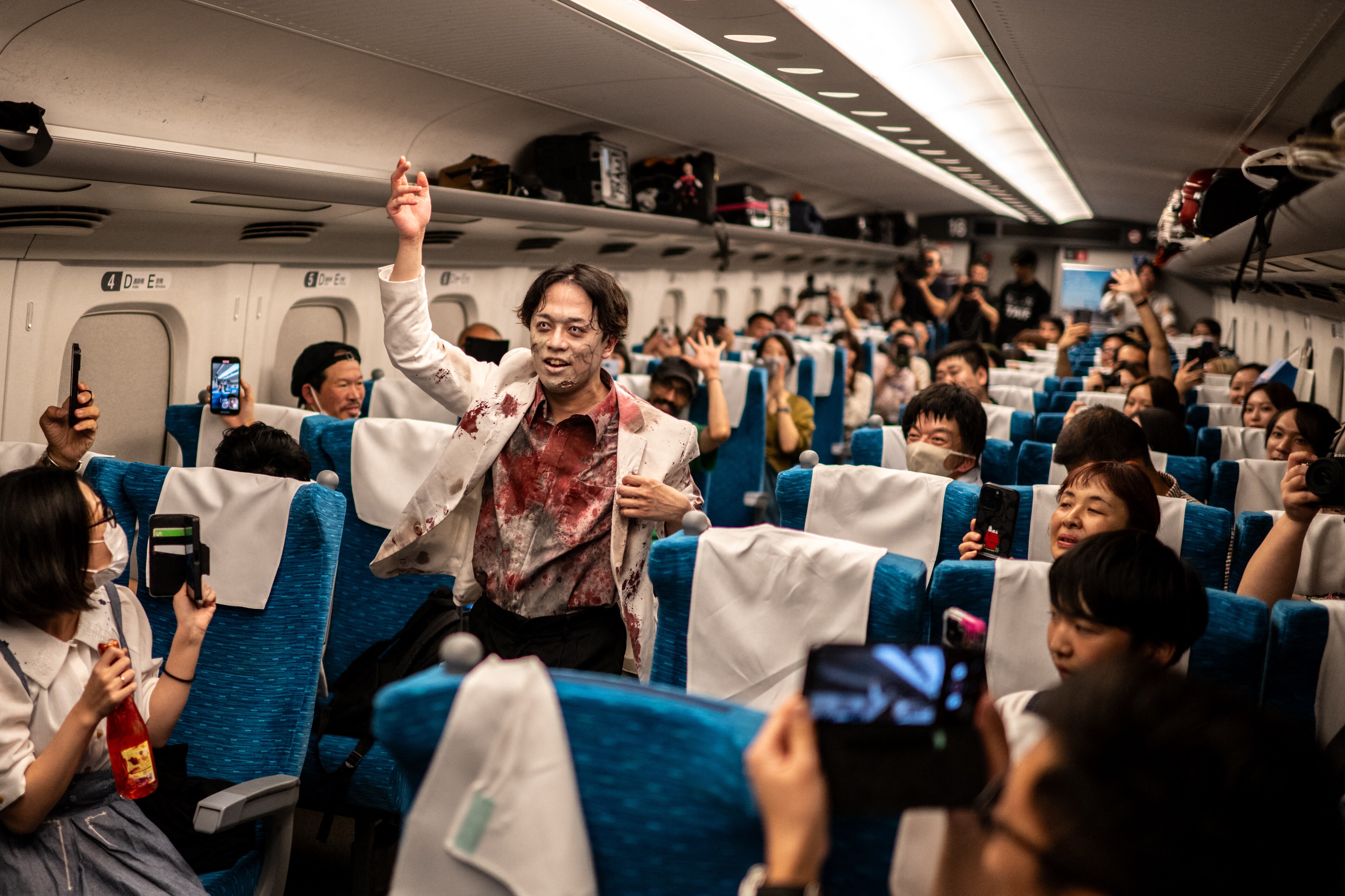 In Pics: 'Zombies' Swarm Japanese Train Ahead Of Halloween In