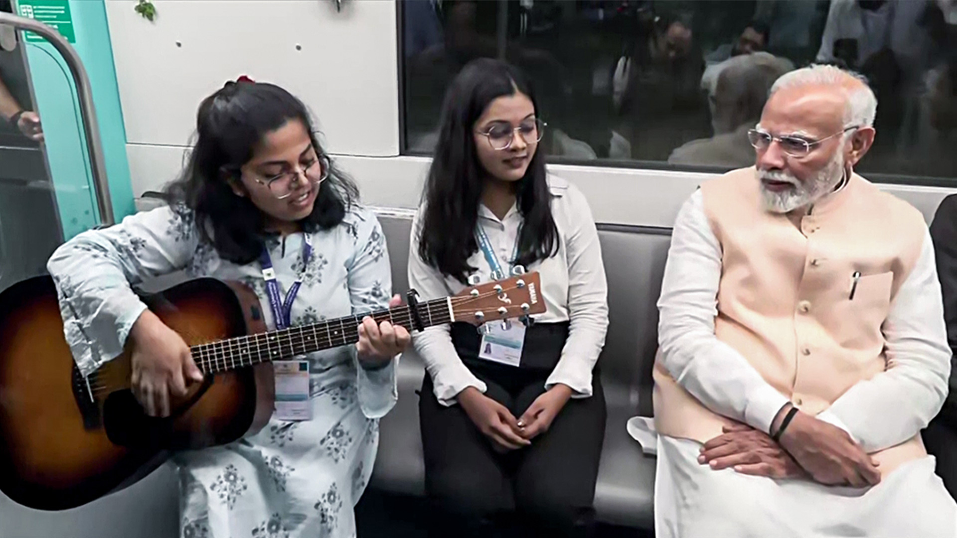 From Tunes Of Guitar To Candid Chat With Students, PM Modi Enjoys Mumbai Metro Ride