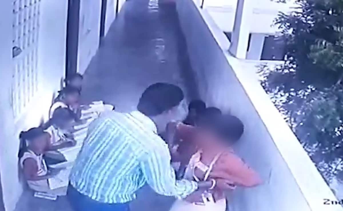 Teacher Holds Boy Down In Telangana, Thrashes Him Mercilessly Teacher Holds Boy Down In Telangana, Thrashes Him Mercilessly