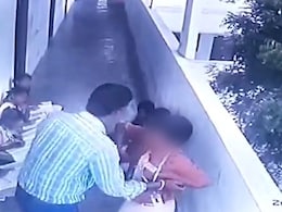 Teacher Holds Boy Down In Telangana, Thrashes Him Mercilessly Teacher Holds Boy Down In Telangana, Thrashes Him Mercilessly