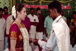 Tamil Man And French Woman Exchange Marriage Vows According To Tamil Tradition Tamil Man And French Woman Exchange Marriage Vows According To Tamil Tradition