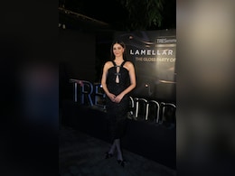In A Sea Of Ethnic Style, It Is Ananya Panday's Sparkling Black Midi Dress That Stands Out Elegantly