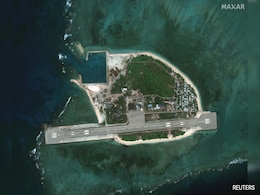 Chinese Ships Surround Island Disputed With Philippines, Satellite Images Show Chinese Ships Surround Island Disputed With Philippines, Satellite Images Show