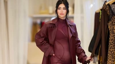 Pregnant With Machine Gun Kellys Child, Megan Fox Is Already Dressing For The Holidays In A Sheer Burgundy Dress With Her Baby Bump On Display Pregnant With Machine Gun Kellys Child, Megan Fox Is Already Dressing For The Holidays In A Sheer Burgundy Dress With Her Baby Bump On Display
