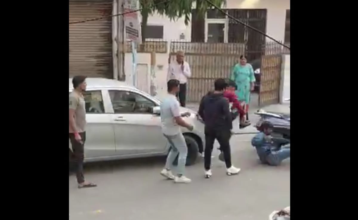 Video: Punches, Kicks Fly As Man Thrashed Over Parking Row In Ghaziabad Video: Punches, Kicks Fly As Man Thrashed Over Parking Row In Ghaziabad