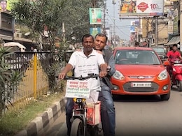 साइकिल की सवारी; स्ट्रीट लाइट बुझाने का काम, झारखंड चुनाव में 'ऊर्जा मैन' की क्यों हो रही चर्चा