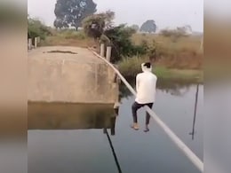 Video: After Bridge Collapse, Man Uses Pipe To Cross Stream In Telangana