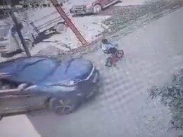 On Camera, Car Runs Over 5-Year-Old Boy On Cycle, He Escapes Unhurt