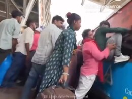 Watch: <i>Coolie</i> Helps Passengers Board Train Through Window In Viral Video