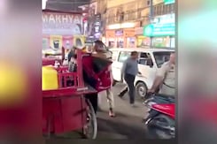 Assam Cop Assaults Delivery Agent For Breaking Traffic Signal, Suspended Assam Cop Assaults Delivery Agent For Breaking Traffic Signal, Suspended