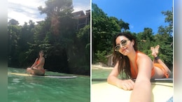 Amyra Dastur's "Good Times And Tan Lines" In Phuket Were Spent In A Bright Orange Swim Set