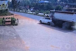 Video: Speeding Truck Rams Reversing Car, Drags It Along, Then Topples Video: Speeding Truck Rams Reversing Car, Drags It Along, Then Topples