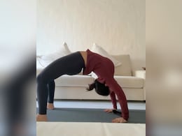 Add These 5 Asanas For Your Postpartum Fitness Routine Like Masaba Gupta Doing <i>Chakrasana</i>