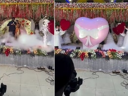 दूल्हा-दुल्हन ने स्टेज पर ली Heart Blast Entry, देखकर यूजर्स बोले- दिल को नहीं किडनी को छू गई ये एंट्री...