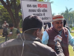 Madhya Pradesh Congress Leaders Take Begging Bowls To Assembly. Here's Why