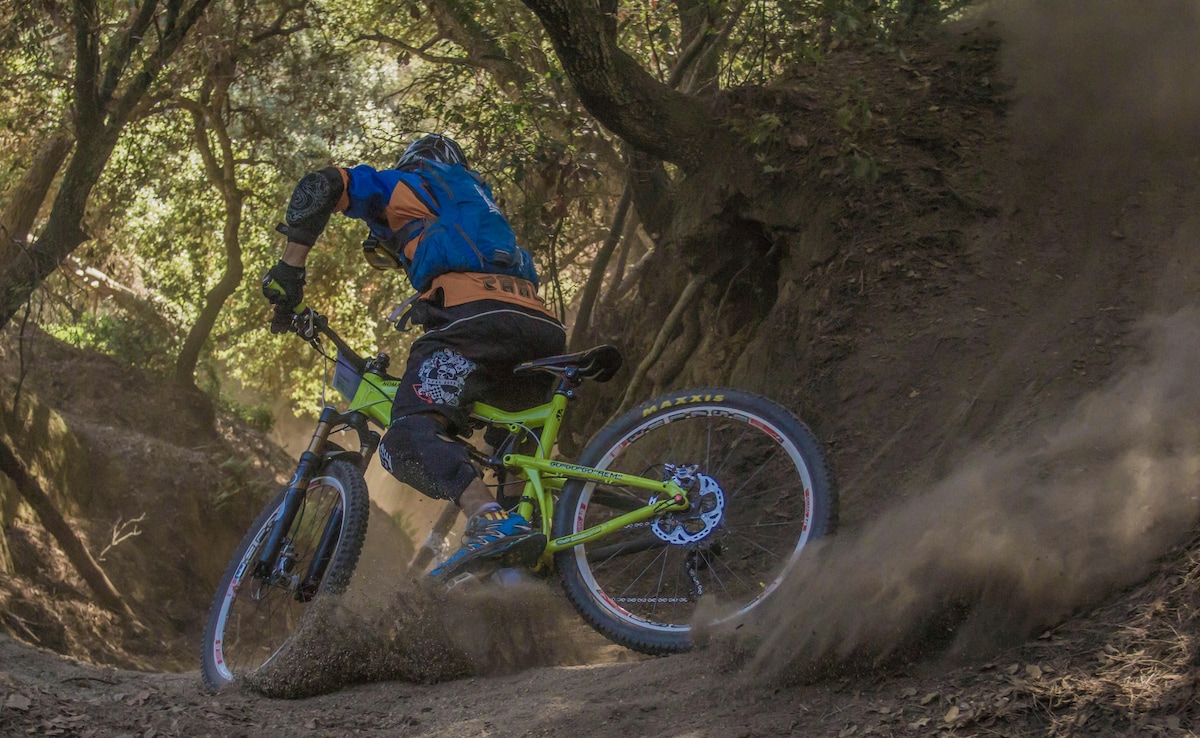 A mountain person finds joy in navigating rocky paths to reach the highest top A mountain person finds joy in navigating rocky paths to reach the highest top