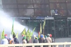 Cops Fire Tear Gas, Use Water Cannon As Farmers Resume Delhi March Cops Fire Tear Gas, Use Water Cannon As Farmers Resume Delhi March