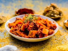 Why Parathas And Spicy Achaar Trigger Gas, Bloating During Winter?