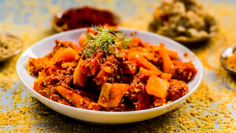 Will Eating Spicy Achaar With Parathas Give You Gas And Bloating In Winter? Here's What To Check