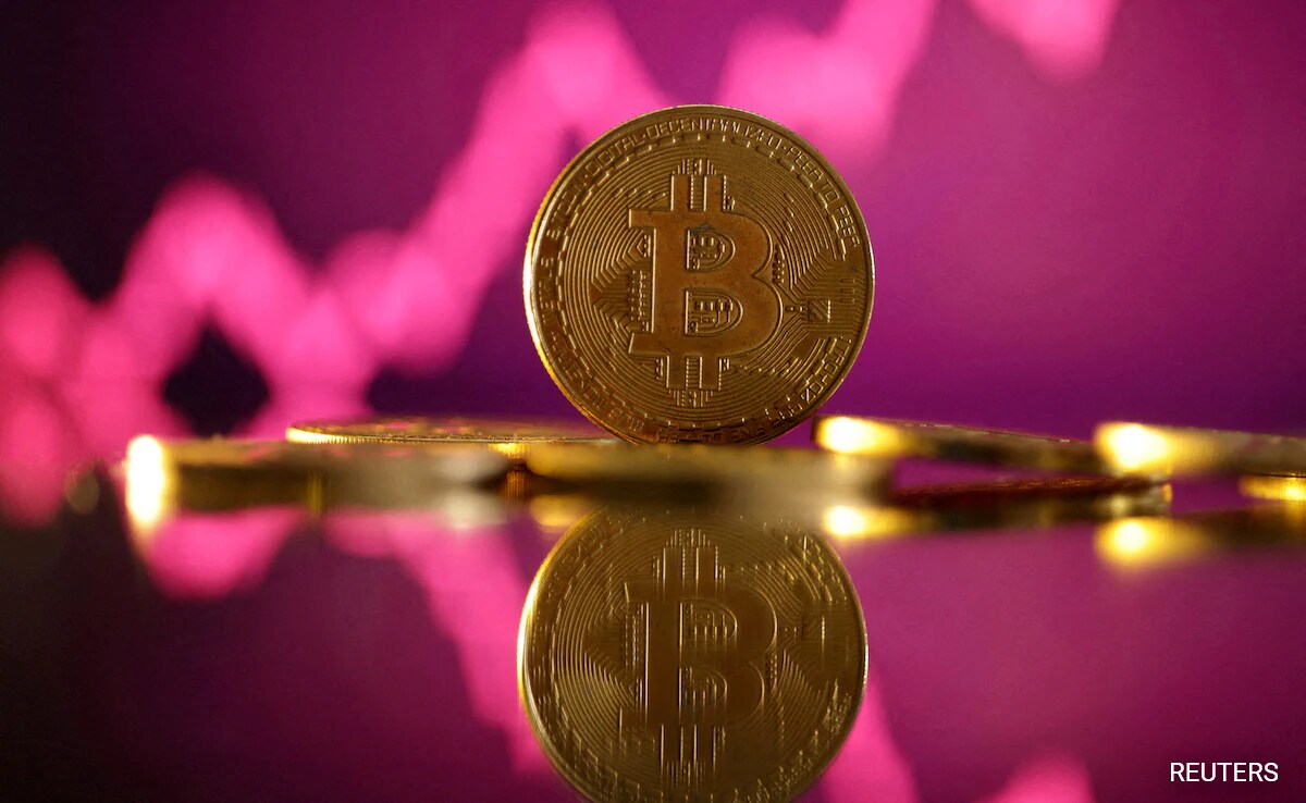 Cryptocurrency Bitcoin Hits New All-Time High Of $100,000