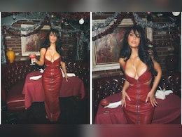 Kim Kardashian's Red Leather Dress Is Definitely On Santa's Nice List Kim Kardashian's Red Leather Dress Is Definitely On Santa's Nice List