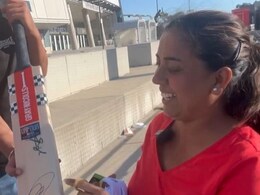 Watch: Female Fan Gets Creative For Rohit Sharma's Autograph, Ties Bat With Rope And Throws It Watch: Female Fan Gets Creative For Rohit Sharma's Autograph, Ties Bat With Rope And Throws It