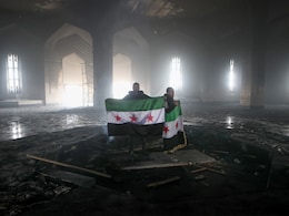 फोटो स्टोरीः देखिए, विद्रोहियों ने असद के पिता की कब्र तक नहीं छोड़ी