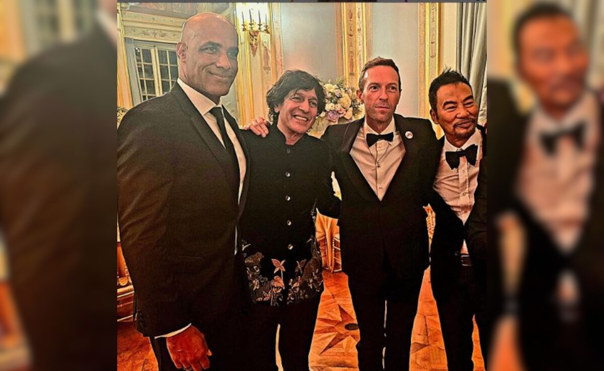 A Blockbuster Frame Featuring Chunky Panday And Coldplay's Chris Martin. Pic Inside