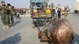 Video: Statues Of Bashar Al-Assad's Father Dragged Through Syria Roads