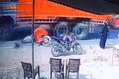Woman Falls From Bike In Front Of Moving Truck In UP, Critically Injured Woman Falls From Bike In Front Of Moving Truck In UP, Critically Injured