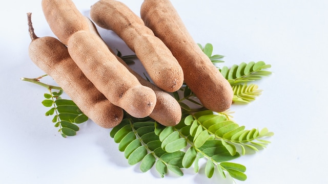 The 'tangy' taste of tamarind comes from tartaric acid, an organic acid