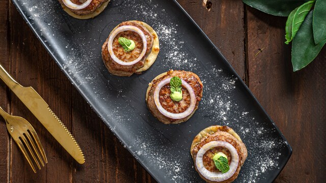 Serve them hot with hung curd dip, mint chutney, and a delectable salad spread
