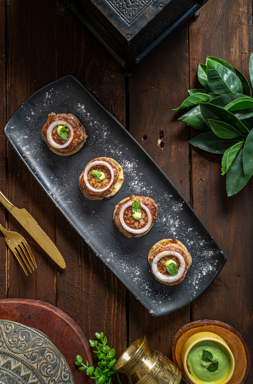 Serve them hot with hung curd dip, mint chutney, and a delectable salad spread