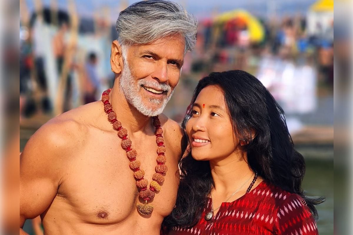 Milind Soman Takes Holy Dip At Maha Kumbh With Wife Ankita Konwar Milind Soman Takes Holy Dip At Maha Kumbh With Wife Ankita Konwar