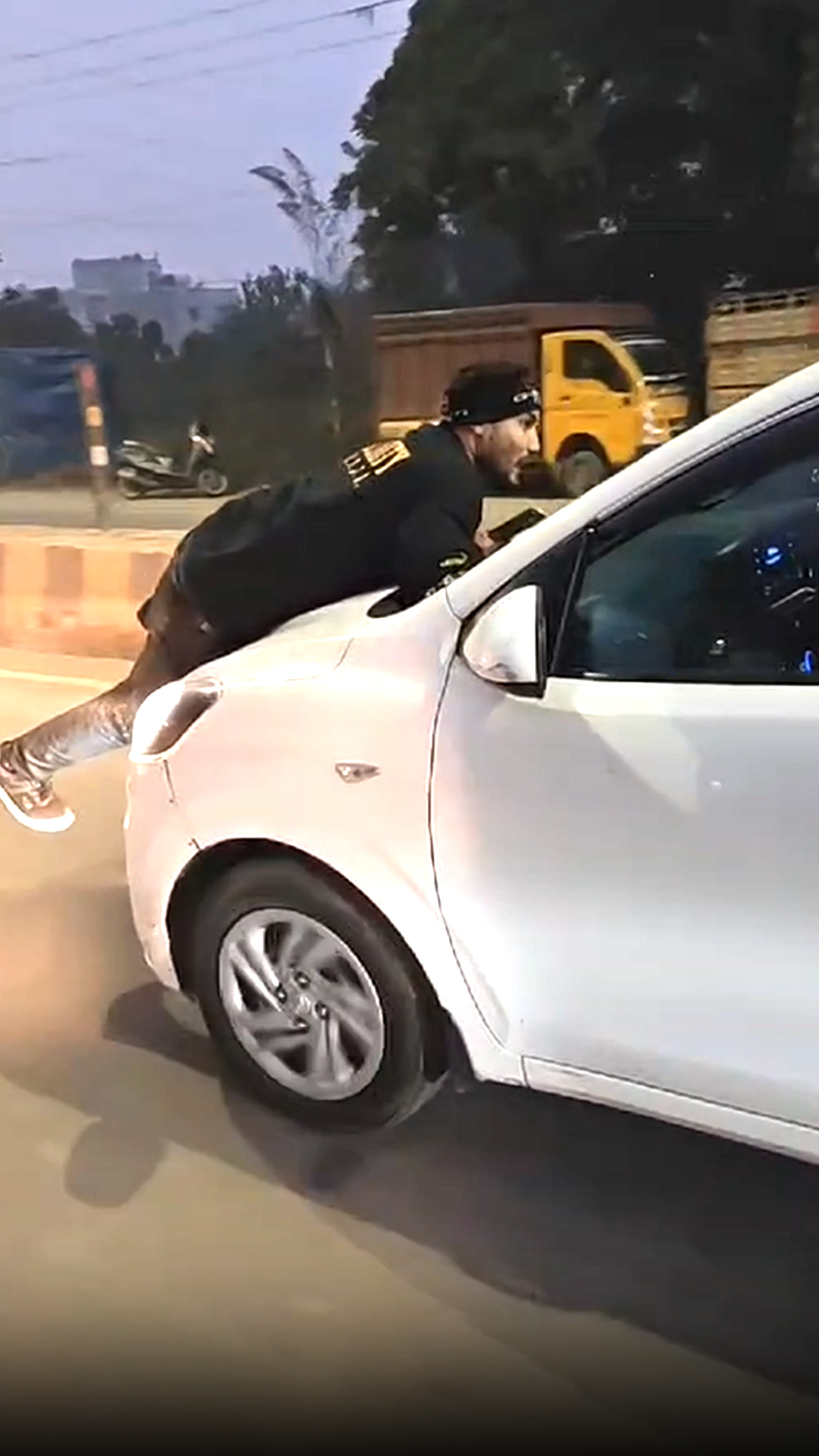 Girlfriend's Husband On Bonnet, Man Drives Car For Kilometres