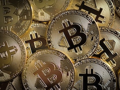 Bitcoin Hits Record High Above $1,24,000