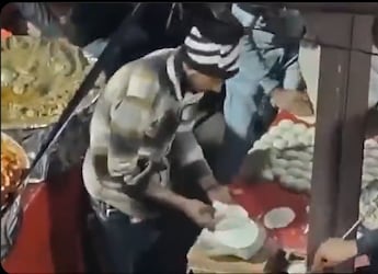 Disturbing Video Of Man Spitting On Rotis At Uttarayan Fair Leads To Arrests Disturbing Video Of Man Spitting On Rotis At Uttarayan Fair Leads To Arrests