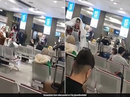 Iranian Woman Removes Cleric's Turban, Wears It As Hijab In Bold Protest Iranian Woman Removes Cleric's Turban, Wears It As Hijab In Bold Protest