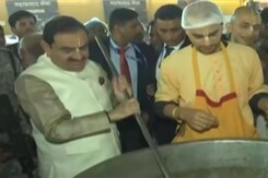 Gautam Adani Attends Maha Kumbh Mela, Helps Cook 'Prasad' Gautam Adani Attends Maha Kumbh Mela, Helps Cook 'Prasad'