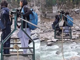 जर्जर रस्सी पर लटकी ट्रॉली में बैठकर स्कूल जा रही बच्चियों का Video वायरल, लोगों ने बताया- बेहद शर्मनाक