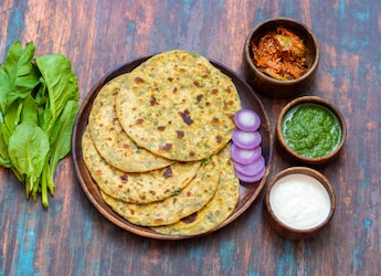 Craving A Flavourful Twist On Parathas? This Cheese Garlic Thecha Paratha Is A Must-Try Craving A Flavourful Twist On Parathas? This Cheese Garlic Thecha Paratha Is A Must-Try