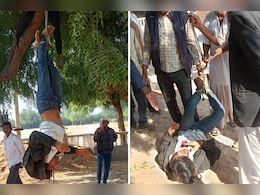 दलित युवक के हाथ-पैर बांध पेड़ से उल्टा लटकाया, फिर जमकर की मारपीट; वीडियो वायरल होने पर जांच शुरू दलित युवक के हाथ-पैर बांध पेड़ से उल्टा लटकाया, फिर जमकर की मारपीट; वीडियो वायरल होने पर जांच शुरू