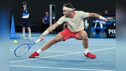 Zheng Qinwen, Casper Ruud Win As Rain Lashes Australian Open On Day One