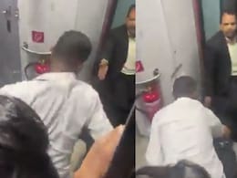 Viral Video: Ticket Checker Pins Down Drunk Man, Train Attendant Flogs Him Viral Video: Ticket Checker Pins Down Drunk Man, Train Attendant Flogs Him