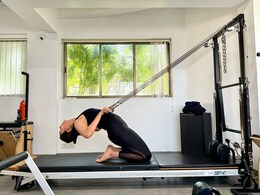 4 Ways A Roll-Down Bar Workout Can Keep You Fit