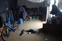 Rain Floods Tents In Central Gaza Strip | Videos Capture A Year Under Stars Rain Floods Tents In Central Gaza Strip | Videos Capture A Year Under Stars