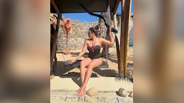 Holiday Style Doesn't Get Any Better Than Shama Sikander In A Chic Black Swimsuit