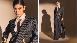 Mouni Roy Adds Modern Twist To Her Traditional Black And White Pinstriped <i>Saree</i>